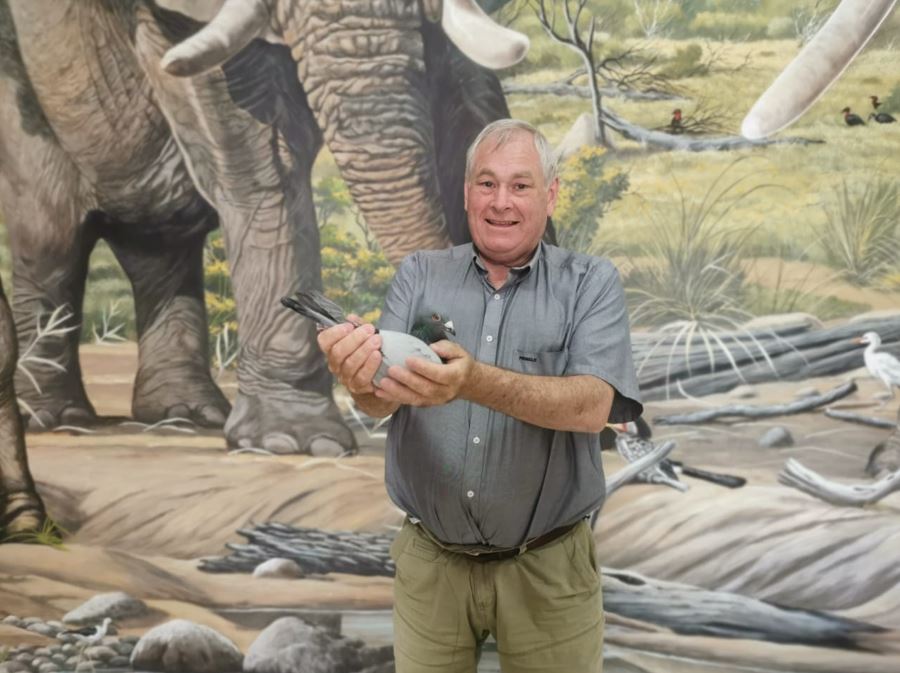 Riaan holding wining bird